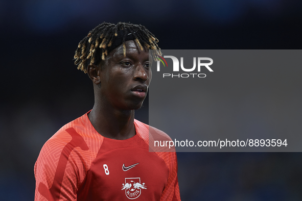 Mohamed Simakan centre-back of RB Leipzig and France during the warm-up before the UEFA Champions League group F match between Real Madrid a...