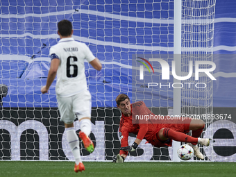 Thibaut Courtois goalkeeper of Real Madrid and Belgium makes a save during the UEFA Champions League group F match between Real Madrid and R...