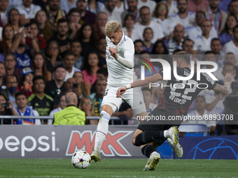 Federico Valverde central midfield of Real Madrid and Uruguay and David Raum left-back of RB Leipzig and Germany compete for the ball during...