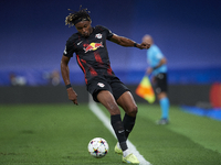 Mohamed Simakan centre-back of RB Leipzig and France controls the ball during the UEFA Champions League group F match between Real Madrid an...