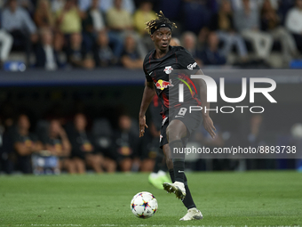 Amadou Haidara central midfield of RB Leipzig and Mali controls the ball during the UEFA Champions League group F match between Real Madrid...