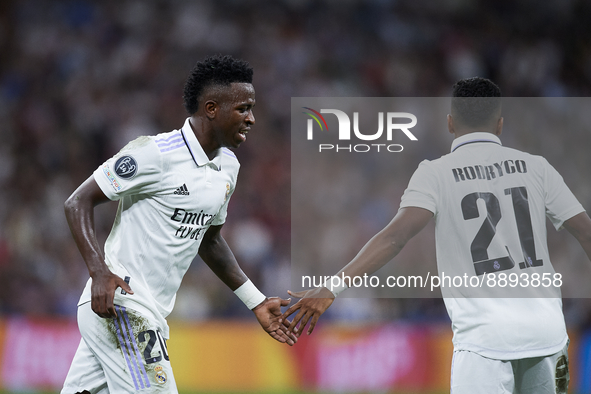 Vinicius Junior left winger of Real Madrid and Brazil and Rodrygo Goes right winger of Real Madrid and Brazil greet each other during the UE...