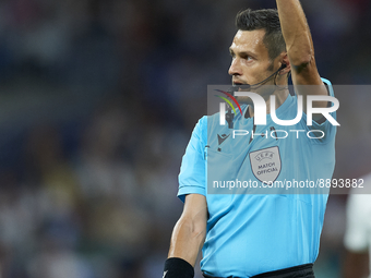 Referee Maurizio Mariani during the UEFA Champions League group F match between Real Madrid and RB Leipzig at Estadio Santiago Bernabeu on S...