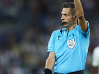 Referee Maurizio Mariani during the UEFA Champions League group F match between Real Madrid and RB Leipzig at Estadio Santiago Bernabeu on S...