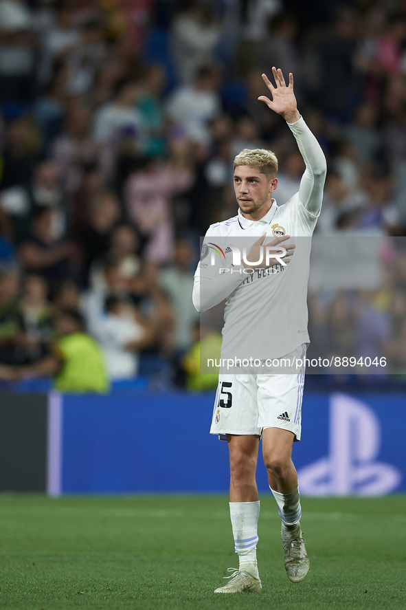 Federico Valverde central midfield of Real Madrid and Uruguay celebrates victory after the UEFA Champions League group F match between Real...