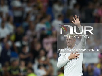 Federico Valverde central midfield of Real Madrid and Uruguay celebrates victory after the UEFA Champions League group F match between Real...