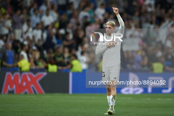 Federico Valverde central midfield of Real Madrid and Uruguay celebrates victory after the UEFA Champions League group F match between Real...