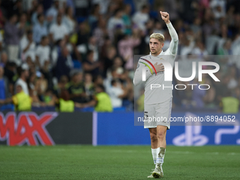 Federico Valverde central midfield of Real Madrid and Uruguay celebrates victory after the UEFA Champions League group F match between Real...