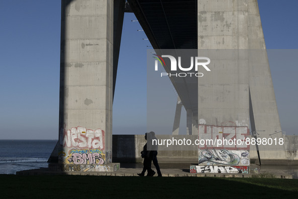 People are seen walking around the walkway of the Vasco da Gama bridge, Lisbon. September 22, 2022. 