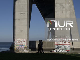 People are seen walking around the walkway of the Vasco da Gama bridge, Lisbon. September 22, 2022. (