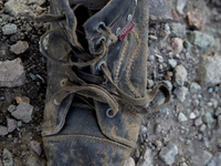 Men's leather boot found near Eftalou on the island of Lesbos.  Shoes found on the beaches and around the Greek island where thousands of im...