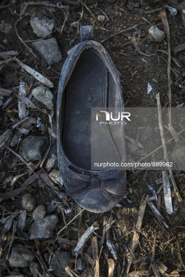 Girls ballet shoe found near Eftalou on the island of Lesbos.  Shoes found on the beaches and around the Greek island where thousands of imm...