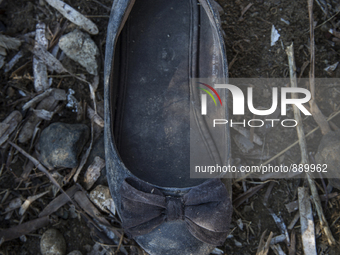 Girls ballet shoe found near Eftalou on the island of Lesbos.  Shoes found on the beaches and around the Greek island where thousands of imm...