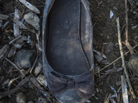 Girls ballet shoe found near Eftalou on the island of Lesbos.  Shoes found on the beaches and around the Greek island where thousands of imm...