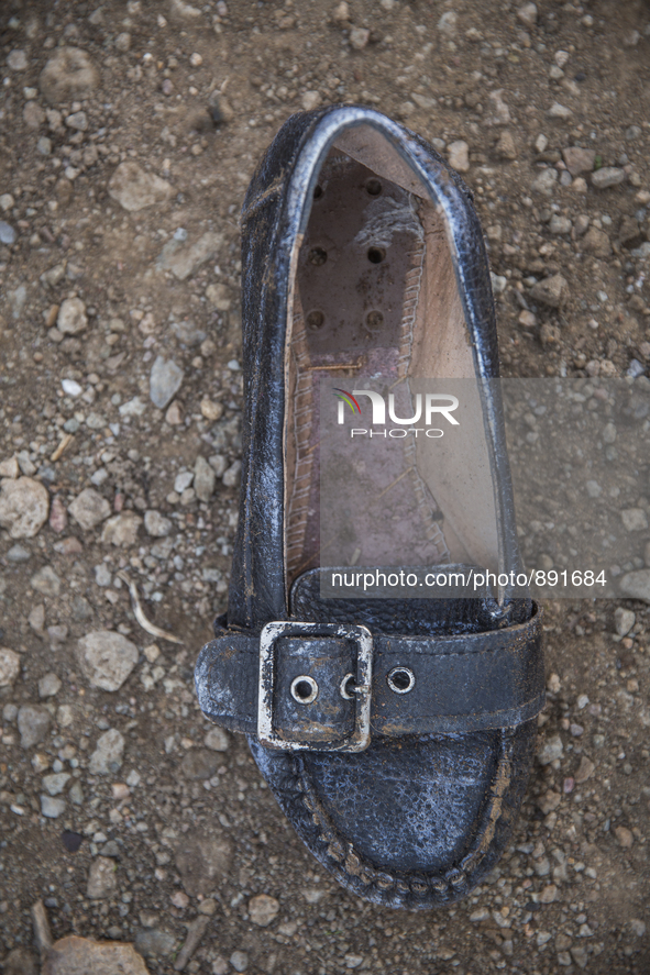 Women's leather loafer found at Molyvos dump on the island of Lesbos.  Shoes found on the beaches and around the Greek island where thousand...