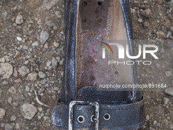 Women's leather loafer found at Molyvos dump on the island of Lesbos.  Shoes found on the beaches and around the Greek island where thousand...