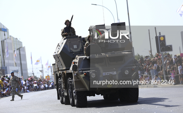 Armored vehicles take part in a military parade as part of the celebration of the 61st anniversary of the independence of the Republic of Cy...