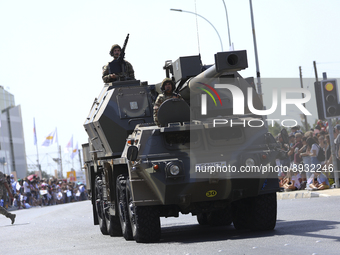 Armored vehicles take part in a military parade as part of the celebration of the 61st anniversary of the independence of the Republic of Cy...