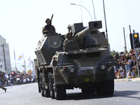 Armored vehicles take part in a military parade as part of the celebration of the 61st anniversary of the independence of the Republic of Cy...