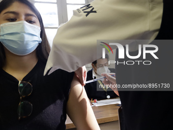 A person receives influenza vaccine during  the national influenza vaccination campaign at the Specialty Clinic. on October 3, 2022 in Mexic...