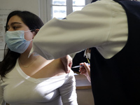 A person receives influenza vaccine during  the national influenza vaccination campaign at the Specialty Clinic. on October 3, 2022 in Mexic...