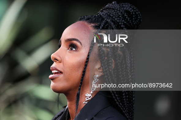 American singer, actress and television personality Kelly Rowland arrives at the Los Angeles Special Screening Of Netflix's 'The Curse Of Br...