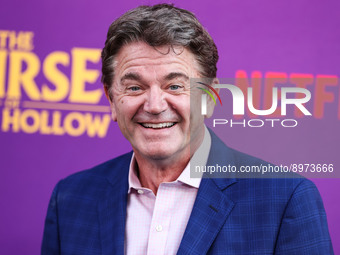 American actor and comedian John Michael Higgins arrives at the Los Angeles Special Screening Of Netflix's 'The Curse Of Bridge Hollow' held...
