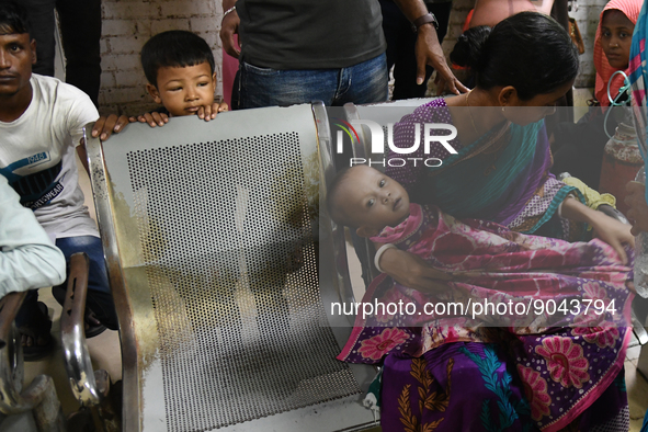 Parents gather in front of the emergency gate as they come to Dhaka child hospital for their Childs’s treatment in Dhaka, Bangladesh on Octo...