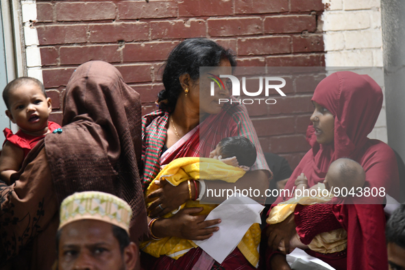 Parents gather in front of the emergency gate as they come to Dhaka child hospital for their Childs’s treatment in Dhaka, Bangladesh on Octo...