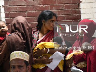 Parents gather in front of the emergency gate as they come to Dhaka child hospital for their Childs’s treatment in Dhaka, Bangladesh on Octo...