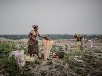 Female scavengers are collecting wastes at Dhapa waste dumping ground, Kolkata, India. September 10, 2015. *** Go to http://nurphoto.com/en/...