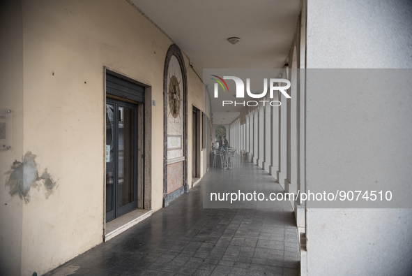 The portico in front of the church, on Piazza Italia, in Tresigallo, a town rebuilt during Fascism following a rationalist ideal. Tresigallo...