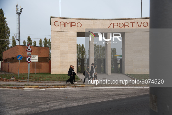 Sport field with monumental entrance and rationalist triumphal arch in Tresigallo, city rebuilt in the fascist era following a rationalist i...