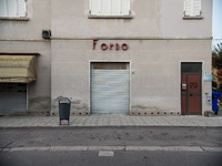 Building facing Viale Roma, one of Tresigallo's main streets, with the Forno (bakery) sign and the shutter down. In Tresigallo, in the provi...