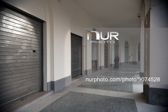 The portico overlooking the monumental Piazza della Repubblica, formerly Piazza della Rivoluzione, built in a characteristic D-shape, in Tre...