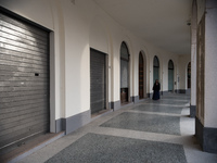 The portico overlooking the monumental Piazza della Repubblica, formerly Piazza della Rivoluzione, built in a characteristic D-shape, in Tre...