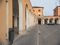 The portico overlooking the monumental Piazza della Repubblica, formerly Piazza della Rivoluzione, built in a characteristic D-shape, in Tre...