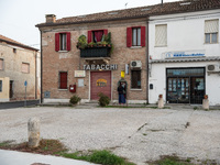 Old buildings and typical Sali e Tabacchi along the central Viale Roma in Tresigallo, in the province of Ferrara, on 23 October 2022. (