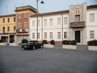 Piazza Italia and in the background the building housing the parish kindergarten, whose façade has been modified to match the fascist style...