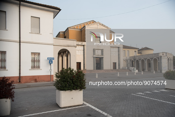 Church and portico in Tresigallo, city rebuilt in the fascist era following a rationalist ideal, in the Ferrara province, Emilia-Romagna, 23...