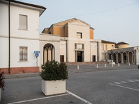 Church and portico in Tresigallo, city rebuilt in the fascist era following a rationalist ideal, in the Ferrara province, Emilia-Romagna, 23...