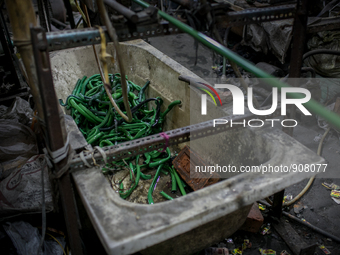 Plastic pipe factory at Dhapa, Kolkata, India. January 17, 2015.  *** Go to http://nurphoto.com/en/reportages/51754 to see more **** (