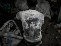 A worker at Dhapa, Kolkata, India. January 17, 2015.  *** Go to http://nurphoto.com/en/reportages/51754 to see more **** (