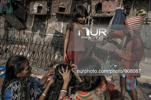 Daily life at Dhapa waste dumping ground, Kolkata, India. January 20, 2015.  *** Go to http://nurphoto.com/en/reportages/51754 to see more *...