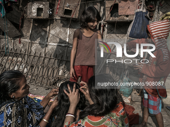 Daily life at Dhapa waste dumping ground, Kolkata, India. January 20, 2015.  *** Go to http://nurphoto.com/en/reportages/51754 to see more *...