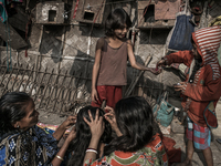 Daily life at Dhapa waste dumping ground, Kolkata, India. January 20, 2015.  *** Go to http://nurphoto.com/en/reportages/51754 to see more *...