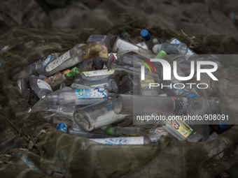 Waste bottles collected from the dumping ground. Dhapa, Kolkata, India. September 13, 2015.  *** Go to http://nurphoto.com/en/reportages/517...