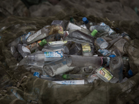 Waste bottles collected from the dumping ground. Dhapa, Kolkata, India. September 13, 2015.  *** Go to http://nurphoto.com/en/reportages/517...