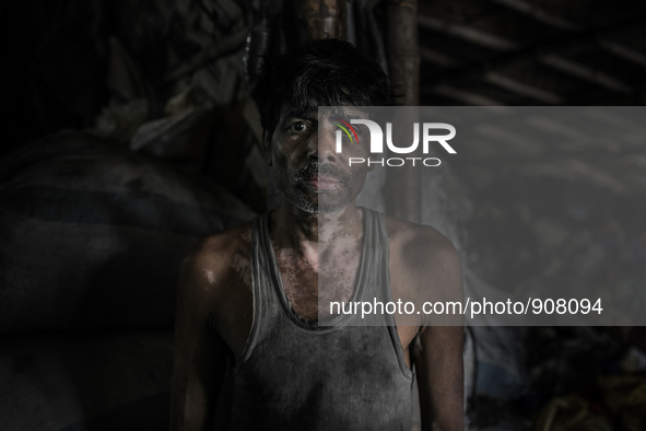 A worker who has been working at Dhapa west dumping ground for 13 years and got skin disease, Kolkata, India. January 17, 2015.  *** Go to h...