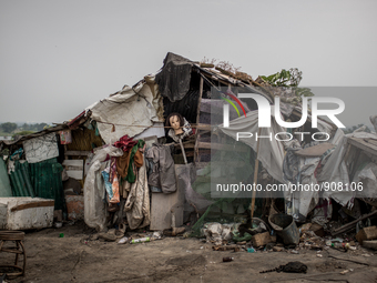 A shelter of a scavenger family at the waste dumping ground. Dhapa, Kolkata, India. September 10, 2015.  *** Go to http://nurphoto.com/en/re...